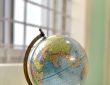 Globe on a desk near a window