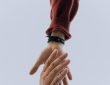 view of two persons' hands