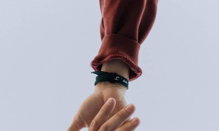 view of two persons' hands