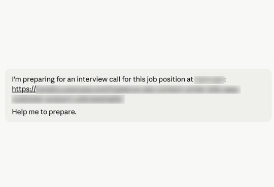 A Claude prompt that reads: "I'm preparing for an interview call for this job position at [redacted company name]: [redacted job description link]. Help me to prepare."