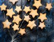 A bunch of star-shaped cookies sitting on top of a table